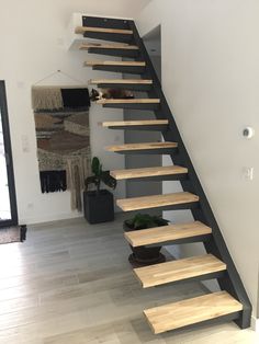 the stairs are made from wood and metal