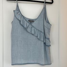 Super Soft Tank, Size L. Never Worn, No Tags. Chic Light Wash Top With Frayed Hem, Chic Light Wash Tops With Frayed Hem, Summer Top With Frayed Hem In Medium Wash, Dark Wash Tops With Frayed Hem For Summer, Dark Wash Frayed Hem Tops For Summer, Casual Light Indigo Denim Top For Summer, Light Blue Chambray Tops For Summer, Light Blue Chambray Tops For Spring, Spring Light Blue Chambray Tops