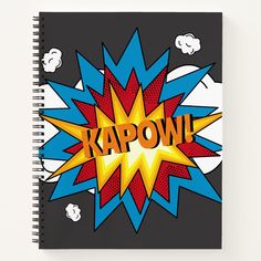 a spiral notebook with the word kapow written in comic pop art style on it