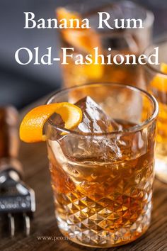 an old fashioned drink with orange slices in it