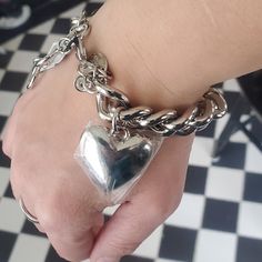 Chico's Silvertone Chunky Chain Link Bracelet, With A Silver Heart And Rhinestone Dangle. The Plastic Is Still On The Heart Of The Bracelet It Has Extention Links. Fits To 9 In A Half Inches. When Worn This Bracelet Has Weight To It. 1st Link - 7 In A Half Inches 2nd Link- 8 In A Half Inches 3rd Link - 9 In A Half Inches D3 Metal Heart Bracelet With Chain, Heart-shaped Metal Bracelet With Chain, Music Note Bracelet, Letter Charm Bracelet, Heart Bangle Bracelet, Green Beaded Bracelets, Chain Heart, Open Cuff Bracelet, Beaded Cuff Bracelet