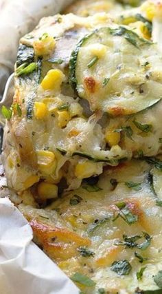 a casserole dish with zucchini and corn