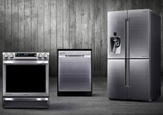 three stainless steel appliance including refrigerator, stove and dishwasher