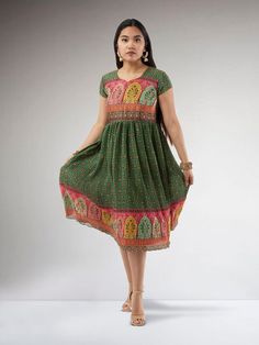 Step into chic sophistication with our Harmony Hues - Dark Green Crushed Knee Length Dress. This charming knee-length Indo Western dress features a deep dark green hue in a crushed fabric, exuding a unique texture and style. The versatile design of this Indo Western attire makes it suitable for both casual gatherings and special occasions. Care Instructions: Dry clean only to preserve the crushed fabric texture and color vibrancy. Ethnic Wear Indian, Western Dresses For Women, Indo Western Dress, Western Dress, Indian Attire, Indo Western, Indian Ethnic Wear, Western Dresses, Fabric Texture