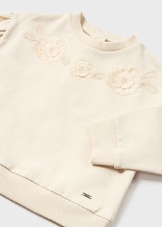 This Beige Embroidered Floral Pullover is perfect for cooler summer nights. Made with soft cotton, it features a playful yet elegant embroidered floral design that adds a touch of whimsy to any outfit. Ideal for girls who want to stay cozy while still looking stylish. Floral Pullover, Baby Design, Appliques, Summer Fun, 12 Months, Floral Design, Van, Floral, Pattern