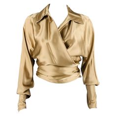 Luxury Long Sleeve Beige Top, Luxury Beige Long Sleeve Tops, Luxury Long Sleeve Blouse For Evening, Luxury Long Sleeve Evening Blouse, Silk Long Sleeve Blouse For Evening, Gold V-neck Blouse For Work, Silk Evening Wrap Blouse, Silk Wrap Blouse For Evening, Chic Long Sleeve Wrap Top For Party