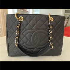 Chanel Handbag Authentic Vintage, Rarely Used. Large (13.5”Wx9.5”Hx4”D). 3 Compartments, One With Zipper. Comes With Original Certificate, Documentation, Cleaning Cloth (Unused), And Protective Storage Cover. Large Luxury Bags With Removable Pouch, Large Designer Shoulder Bag With Handle Drop, Luxury Large Shoulder Bag With Removable Pouch, Luxury Large Shoulder Bag With Top Carry Handle, Large Elegant Black Bag, Elegant Large Black Bag, Large Black Luxury Bag, Large Luxury Black Bag, Large Black Designer Bag