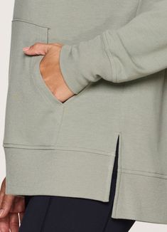 Featuring a functional front pocket and lightweight, breathable french terry fabric, our Long Weekend Hoodie Tunic was designed for versatile wear without sacrificing style. A slightly oversized, tunic length design offers optimal comfort, sleeve scrunching and layering options, while an attached hood with adjustable drawstrings protects you from the elements. Finished with a flattering v-neckline, this legging-friendly pullover can be worn year-round with your favorite active legging or fashion bottoms for an easy, cohesive look. Comfortable Cotton Sweatshirt With Double-lined Hood, Stretch Solid Sweatshirt With Double-lined Hood, Stretch Solid Color Sweatshirt With Double-lined Hood, Functional Long-sleeve Nylon Hoodie, Long-sleeved French Terry Sweatshirt With Drawstring Hood, Tunic Hoodie, Fashion Bottoms, French Terry Fabric, Active Leggings