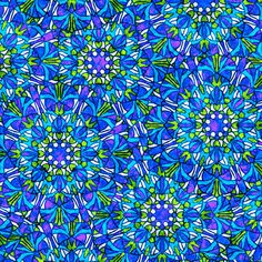 an abstract blue and green background with many small flowers in the center, all on one side