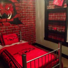 a bedroom with brick walls and a metal bed frame