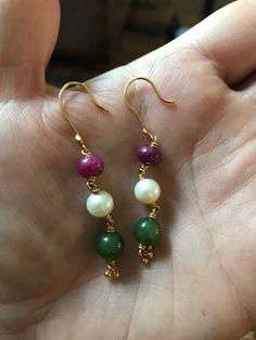 "Make a splash with these traditional solid gold Indian earrings have simple and refined styling. Perfectly sized for a night out on the town (1.75\" in length). These simple gold earrings are set with finely polished pink ruby, green emerald, and white pearl bead cabochon beads. Weight is 7.7 grams for the pair. Stamped 916, K, PJR. Beads measure between about 7.8mm and 8.3mm. At the bottom of the earring are three little beads that dangle. Please see other jewelry here: http://www.etsy.com/sho Elegant Polished Beads Dangle Earrings, Elegant Dangle Beaded Earrings With Polished Beads, Elegant Polished Beaded Dangle Earrings, Elegant Dangle Earrings With Polished Beads, Festive Gold Earrings With Polished Beads, Elegant Gold Earrings With Polished Beads, Gold Earrings With Polished Beads For Gift, Elegant Festive Earrings With Round Beads, Elegant Round Bead Earrings For Festive Occasions