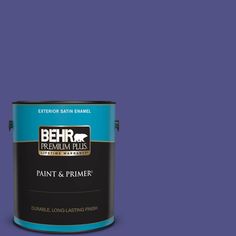 a green paint can with the words behr ultra stain - blocking paint and primer in