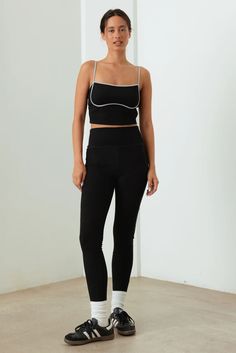 Elevate your boutique's activewear collection with our Chic Contrast Trim Ribbed Workout Set! This stylish two-piece ensemble combines fashion-forward design with functional comfort, perfect for the modern woman who demands both style and performance from her workout gear. 🖤 Complete the look: Layer with an oversized hoodie for a trendy athleisure outfit Pair the crop top with high-waisted jeans for a casual day look Add a lightweight jacket for a put-together post-gym ensemble 🖤 Features: Rib Athleisure Stretch Crop Top For Loungewear, Trendy Fitted Activewear With Ribbed Waistband, Seamless Tight Casual Activewear, Casual Seamless Tight Activewear, High Waist Seamless Activewear For Loungewear, Sporty Stretch Crop Top For Loungewear, Trendy Activewear With Ribbed Waistband For Workout, Trendy Seamless Activewear With Medium Support, Trendy Seamless Medium Support Activewear