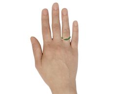 Inspired by the relationships that bring meaning to our lives, this Boochier ring is the perfect combination of color and sparkle. One half of the 18K yellow gold band is covered in shimmering white diamonds and the other in a surface of royal green emeralds. The two colors twist together to create a composition that has the perfect amount of contrast. Statement-making yet easy-to-wear, this ring can be worn alone or stacked! diamonds : 1mm diameter each : .7cttwemeralds : 1mm diameter each : 1. Luxury Green Half Eternity Ring, Green Emerald Ring With Single Cut Diamonds For Promise, Emerald Green Promise Ring With Single Cut Diamonds, Green Diamond Promise Ring With Single Cut Diamonds, Jewelry Facts, Daniela Villegas, Twist Jewelry, Alice Cicolini, Jennie Kwon