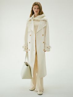 Editor's NotesThis relaxed silhouette trench coat is made from a crisp cotton-nylon blend for a lightweight, comfortable fit. The double closure adds points to the flap on one side and the panel on the back.- Wide collar design that makes your style enhanced- Tone-on-tone button details as a refined touch- Waist belt that can be tied with for various stylingsMeasurements(in.)One Size(XS-M)- Length: 50 in.- Armhole: 13.39 in.- Bust: 24.02 in.- Hem: 27.95 in.- Sleeve length: 29.53 in.- Sleeve cuff width: 9.26 in.- Belt length: 65.75 in.* Model info(Sofie): Height 5’ 68” Bust 31' Waist 24' Hip 34'* Please note that the provided measurements are based on one side.Composition & Care- 51% Cotton, 49% Nylon / Lining: 52% Viscose, 48% Polyester- In order to wear clothes for a long time and pre Spring Gabardine Outerwear For Daywear, Cotton Raincoat For Workwear In Fall, Fall Cotton Raincoat For Workwear, Fall Cotton Raincoat For Work, Spring Outerwear With Double Button Closure, Spring Outerwear With Double Button Closure For Everyday, Solid Raincoat For Work In Spring, Sleeve Cuff, Collar Designs