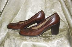 "Vintage brown stacked wooden heels, sz 6 N, made in Italy. Shoes have tooled design on the top and are in great condition, measurements are Heel to toe 9.5\" Width 3\" heel height 3\"" 1970s Shoes Women 70s Fashion, Womens Shoes From The 90s, Vintage Brown Heels With Wooden Heel, Vintage Brown Heels With Stacked Heel, Brown Vintage Heels With Stacked Heel, Vintage Heels With Stacked Heel, Vintage Brown High Heel Shoes, Vintage Brown High Heel Heels, Vintage Heels With Stacked Heel And Almond Toe