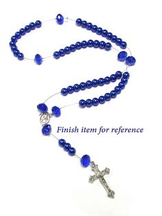 Other colors check here - https://etsy.me/3logmRC https://etsy.me/2IxOuvW https://etsy.me/2GWzhUG https://etsy.me/35jbIPc This Rosary Bead Kit is perfect as a special gift for a young one's First Holy Communion or Reconciliation, for a mother on the day her child's Baptism, or even as a gift to yourself to strengthen your bond with prayer. Beading is an engaging activity for students spending time at missions, seniors keeping their faith, and really anyone who loves crafting jewelry. This Rosary Adjustable Blue Beaded Rosary, Adjustable Blue Cross Necklace, Blue Adjustable Cross Necklace, Blue Spiritual Jewelry For First Communion, Adjustable Blue Cross-shaped Jewelry, Rosary Bead Necklace, Communion Centerpieces, Baptism Centerpieces, Blue Rosary