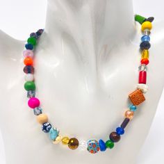 This beautiful colorful beaded necklace is handmade with a variety of gemstones that make this necklace stand out when you are wearing it excellent gift for her, mom, friendship, best friend, teacher, This beautiful necklace comes in different sizes and has a 2-inch extension chain. *Beads may vary slightly ITEM DETAILS Materials: Czech crystal, jade, multicolor quartz, quartzite stone, coral, wood beads Bohemian Rainbow Beaded Necklaces With Wooden Beads, Colorful Bohemian Faceted Beads, Bohemian Rainbow Beaded Necklace With Wooden Beads, Multicolor Wooden Beads Necklaces For Jewelry Making, Adjustable Multicolor Crystal Necklaces With Large Beads, Adjustable Multicolor Crystal Necklace With Large Beads, Multicolor Wooden Beads For Jewelry Making, Casual Multicolor Round Bead Necklaces, Casual Multicolor Round Beads Necklaces