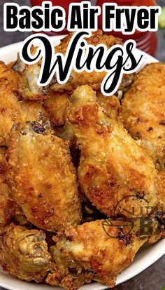 the words basic air fryer wings are in front of an image of fried chicken