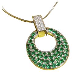 massive pendant in luxury quality, rectangular loop set with full-cut brilliant-cut diamonds total approx. 0.16 ct, TW-W (fine white-white) / VS (very small inclusions), heavy oval muggle pendant plate set with the finest tsavorites (green garnet) total approx. 0.94 ct, dimensions of the pendant approx. 28 x 17.8 mm, without chain, total weight approx. 10 grams, 750/18kt White Gold, all information was checked for authenticity and quality information by a jewelery appraiser, every customer recei Loop Pendant, 20 Euro, Green Garnet, White White, Brilliant Cut Diamond, Garnet, Jewelry Necklace Pendant, Diamond Cuts, Jewelry Necklaces