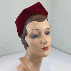 Circa: 1930s Red. Ravishing Red is always a head turner. Ruby Red velvet folded and sculpted into a small turban styled hat with a small peaked top. Geometric stitch work on the velvet. Very deco in look. In such wonderful condition this hat deserves to be shown off again.  DO YOU ACCEPT OFFERS? We do NOT accept offers or negotiate on pricing. We do offer layaways and have sales throughout the year. Shipping overages are always refunded. Label: Unmarked Fabric:  velvet, cotton lining Measurement Vintage Red Flat Cap, Turban Mode, Large Brim Hat, Velvet Turban, Types Of Hats, Vintage Millinery, Stitch Work, Velvet Hat, Feather Hat