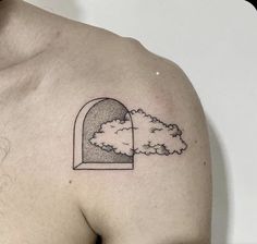 a man's chest with a cloud and window tattoo on it