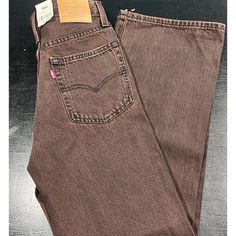 Elevate Your Denim Game With These Levi's Women's Brown Cotton Baggy Bootcut Leg Jeans. The 100% Cotton Denim Fabric Type And 5-Pocket Design With Button Closure Give It A Classic Look, While The Solid Pattern And Comfort Features Make It Perfect For Any Occasion. This Pair Of Jeans Is Brand New With Tags And Has Never Been Worn Before. Perfect For The Summer Season, This Pair Of Levi's Jeans Is Machine Washable And Has A 31-Inch Inseam, Best Suited For Women With A Waist Size Of 24 Inches. Avai Brown Flare Jeans With Five Pockets, High Rise Brown Flare Jeans For Fall, Brown Flare Jeans With Five Pockets For Fall, Brown Relaxed Fit Mid-rise Jeans, Casual Brown Flare Jeans With Five Pockets, Mid-rise Brown Flare Jeans For Fall, Casual Brown Straight Jeans, High Rise Brown Denim Flare Jeans, Brown Wide Leg Jeans With Pockets