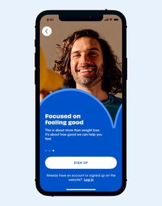 an iphone screen with the text focused on feeling good above it is a photo of a smiling man