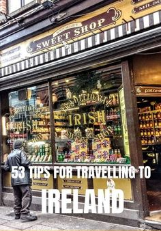 a man standing in front of a store with the words 53 tips for traveling to ireland