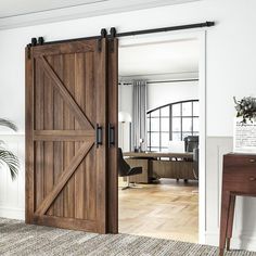 an open sliding barn door in a living room