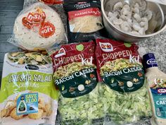 the food is laid out on the counter ready to be cooked and put in the oven