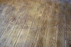 a wooden floor that has been cleaned and is brown