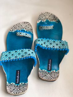 Blue embossed and Beaded Boho Style Kolhapuri Chappals/Sandals for Women, Shoes for Women, Women Flats, Slip Ons, Indian Ethnic flop flip, Royal shoes, traditional style Women, Wedding Shoes, Bridal Shoes An enticing and comfortable pair of Indian slippers. Must have in your shoe collection. Contemporary sandals which will compliment every kind of outfit. PERFECT FOR ANY OCCASION AND ANY OUTFIT!! SOLE SIZE: *US 6-------Size 36---------23.5 cms (Foot Size) *US 7--------Size 37---------23.9 cms (F Traditional Blue Closed Toe Sandals, Bohemian Blue Closed Toe Sandals, Traditional Sandals For Vacation Festivals, Traditional Blue Open Toe Sandals, Traditional Closed Toe Slippers For Beach, Traditional Closed Toe Toe Ring Sandals For The Beach, Blue Open Toe Sandals For Festival, Traditional Flat Toe Ring Sandals For Beach, Traditional Blue Sandals For Summer