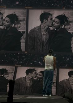 a man standing in front of a wall with pictures of him and his girlfriend on it