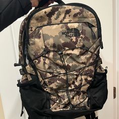 New Never Used Camo Northface Backpack The North Face Puffer Case, Casual The North Face Backpack For Daily Use, Casual North Face Outdoor Bags, The North Face Rectangular Travel Backpack, The North Face Travel Bags With Adjustable Straps, The North Face Backpack For Hiking, The North Face Outdoor Standard Backpack, The North Face Hiking Backpack, North Face Bag