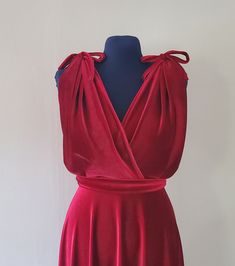 Grecian style Velvet Bridesmaid dress  Comfortable simple style handmade to order in any shape and size. This beautiful dress has soft gathered straps with a bow to tie them in place for the Grecian style sleeve Made to measure so please message me for details on measurements and how to take them. Maxi length dress £80 knee length up to 27 inches £70 Handmade by me in a range of colours from a high quality stretch Velvet fabric which is very soft and comfortable. Fabric samples are FREE of charg Velvet Sleeveless Dress For Wedding, Red Velvet Dress For Prom, Red Sleeveless Bridesmaid Dress For Formal Occasions, Sleeveless Velvet Wedding Dress, Sleeveless Velvet Dress For Wedding, Velvet V-neck Dress For Wedding, Velvet V-neck Wedding Dress, Red V-neck Velvet Party Dress, Sleeveless Fitted Velvet Wedding Dress