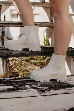 This Chelsea boot is all the rage this season! This chunky flat boot is not only stylish but practical too! The faux leather allows for durability, the thick treaded bottom will allow traction, and the elastic sides allow you to easily pull on and off this boot. Pair with your favorite fall outfit for a perfect stand out look. Fits true to size. Man made materials. Off White Chelsea Boots, Chunky Flat Boots, Baby Necklace, White Boots, Fall For You, Boots Fall, Chelsea Boot, Flat Boots, Modest Dresses