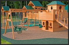 a wooden play set with swings and slides