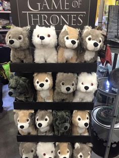 several stuffed animals are on display in a game of thrones store