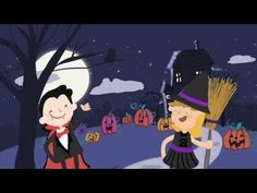 a boy and girl dressed up as witches in front of a tree with pumpkins