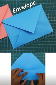 someone is making an origami envelope out of blue paper and pink construction paper