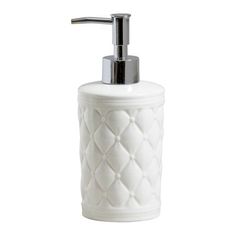 white ceramic soap dispenser with diamond pattern design and chrome faucet