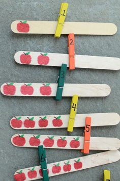 apples and numbers on clothes pegs for counting