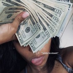 a woman covering her eyes with money in front of her face and the caption reads, add to start