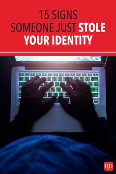 someone typing on their laptop with the text 15 signs someone just stole your identity