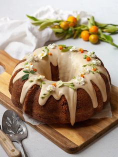 a bundt cake sitting on top of a wooden cutting board