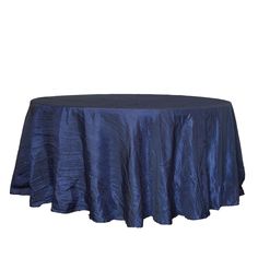 a round table covered in blue satin