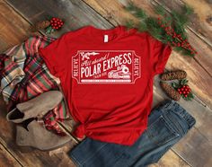 Youth Polar Express Shirt - Polar Express Shirt - Polar Express Shirt - Kids Christmas Shirt - Christmas Shirt This is a super adorable Kids Polar Express Ticket Shirt. Perfect for your visit with Santa, Christmas Eve, Polar Express Train Ride or School. Made with Heat Transfer Vinyl. This is a unisex fit shirt made with 100 % Cotton. Please check measurements before ordering. Please be aware we are not responsible for sizing errors. We love custom orders. Just message us! Thank you for shopping Winter Things, Merry Christmas Yall, Christmas Shirts For Kids, Polar Express, Family Christmas Shirts, Silhouette Files, Christmas Tees, Holiday Shirts, Branded Shirts