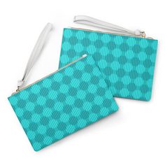 Designed with a loop handle to quickly free your hands, this custom clutch bag is made for the fashionista on the go. It can hold everyday essentials such as a phone, wallet, and keys. It features a zip fastening and a fully lined internal pocket. It is made of vegan leather in the Saffiano pattern finish that was invented by Prada. .: Vegan leather .: Saffiano pattern finish .: Small pocket inside .: Black lining Before cleaning the bag, remove all the items from the bag. Suggested to pretreat Blue Pouch Cosmetic Bag For On-the-go, Modern Blue Compact Bag, Modern Blue Bag For Gifts, Modern Blue Bags For Gifts, Modern Blue Bags As Gifts, Blue On-the-go Pouch Cosmetic Bag, Blue On-the-go Cosmetic Pouch, Blue Clutch Cosmetic Bag For Travel, Blue Cosmetic Bag With Removable Pouch For Travel