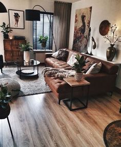 a living room filled with furniture and decor